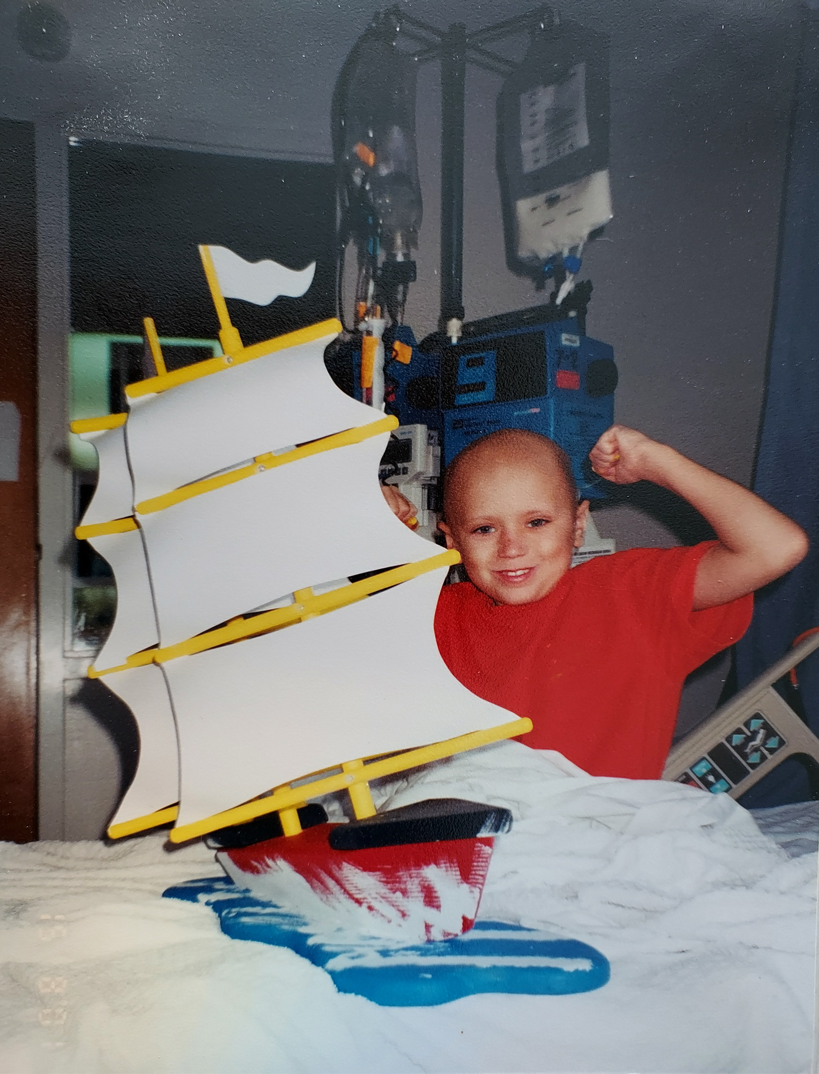 Boy-with-completed-boat